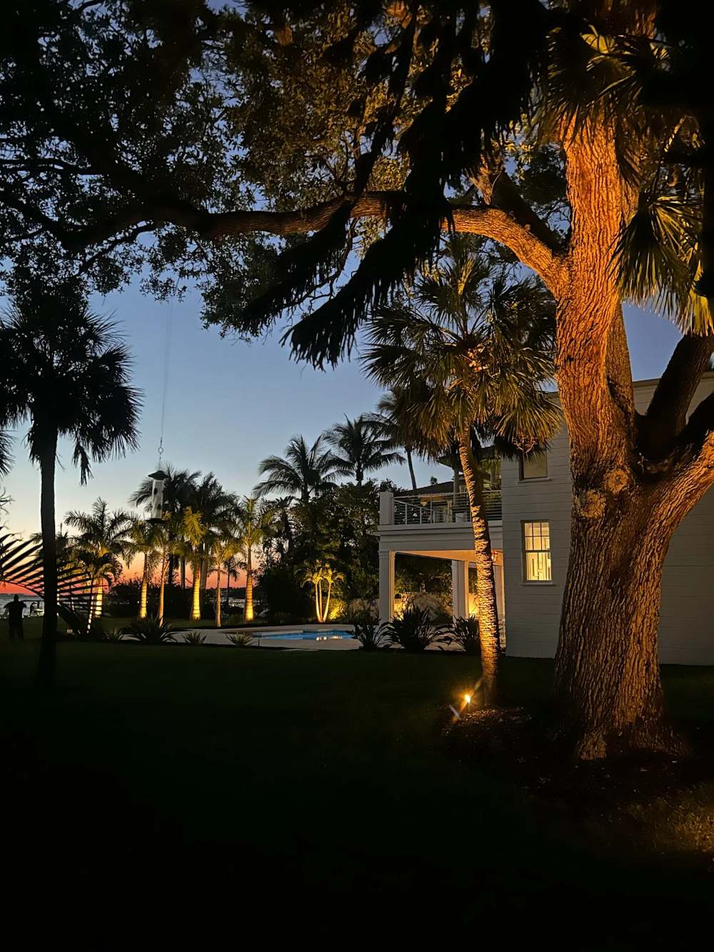 Landscape lighting around a residence at night
